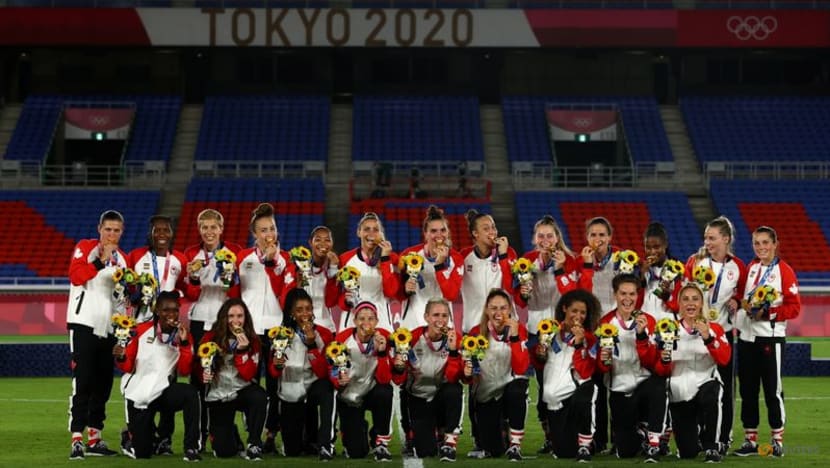 Olympics-Soccer-Sinclair finally claims soccer gold for Canada Olympics-Soccer-Sinclair finally claims soccer gold for Canada