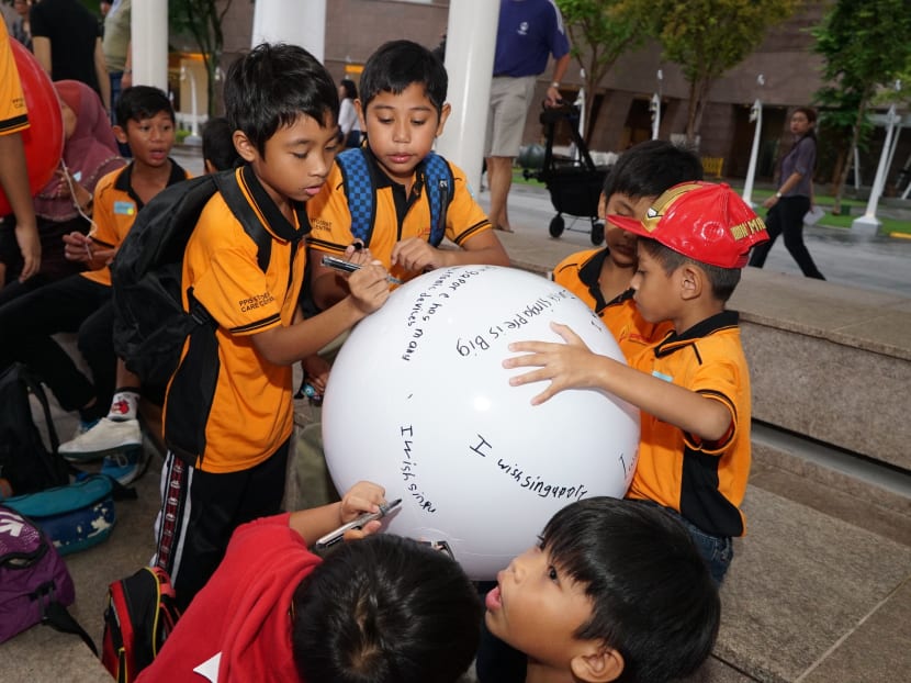 Gallery: Wishes from close to 200 beneficiaries released at Marina Bay