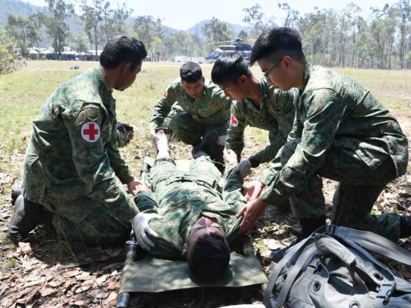 A simulation of emergency drills during a military exercise overseas. The Committee of Inquiry that looked into the death of actor Aloysius Pang said that the SAF should consider familiarising medical officers with the Republic of Singapore Air Force’s helicopter evacuation protocols.