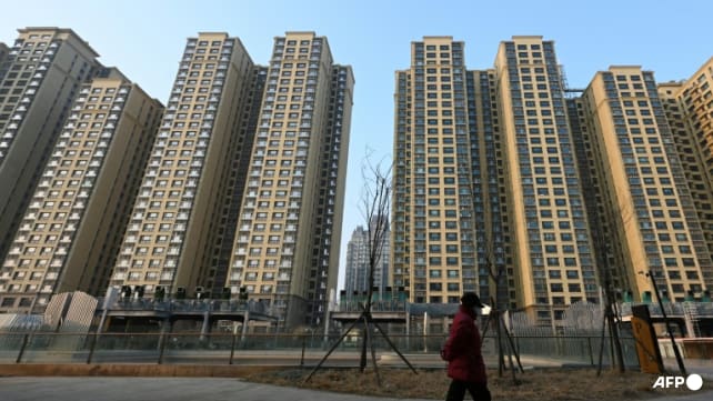 Shanghai lifts home-buying curbs to boost property sector