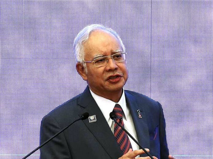 Malaysian Prime Minister Najib Razak said that the country faces an "uphill battle" to become a developed nation in the next five years. Photo: Reuters