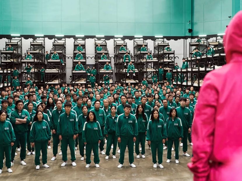 The characters in “Squid Game”, the South Korean television hit, compete for a big cash prize to pay off their huge debts. The characters in “Squid Game”, the South Korean television hit, compete for a big cash prize to pay off their huge debts.