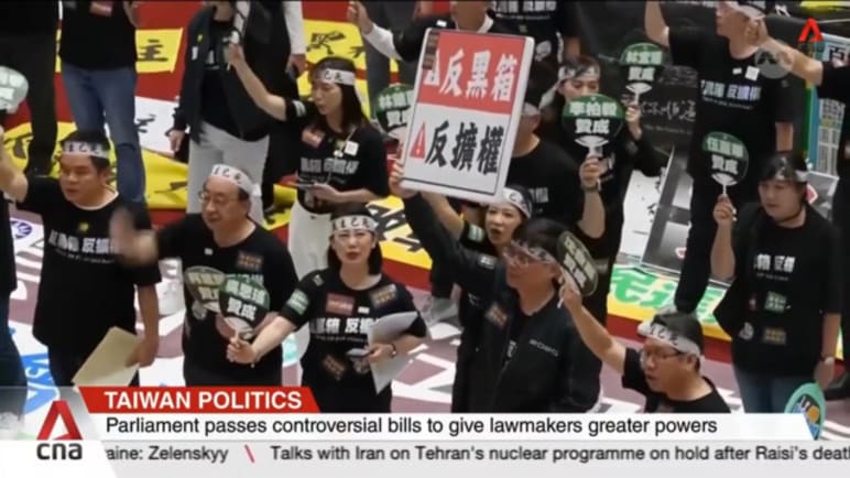 Taiwan's parliament passes controversial legislation, sparking protests