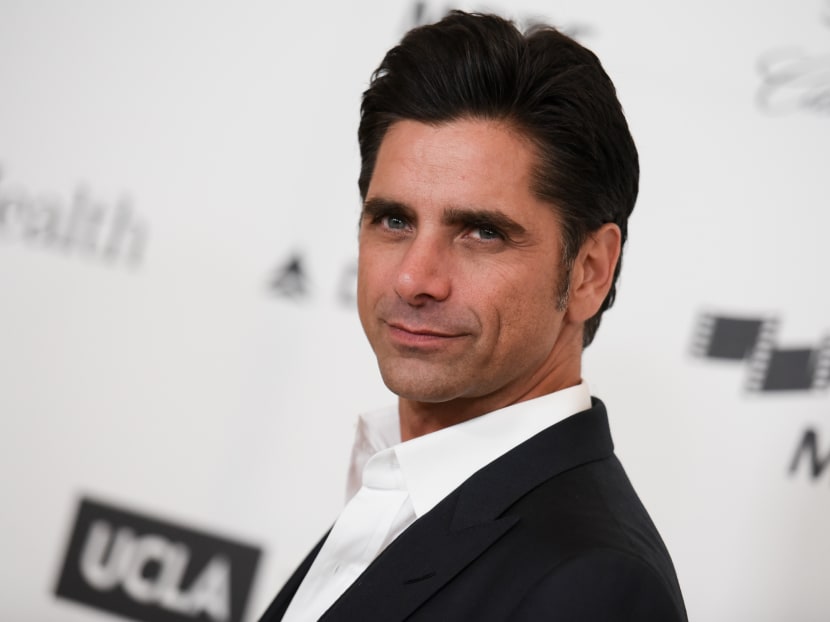 This April 25, 2015, file photo shows actor John Stamos arriving at the 4th Annual Reel Stories, Real Lives Benefit in Los Angeles. Photo: AP