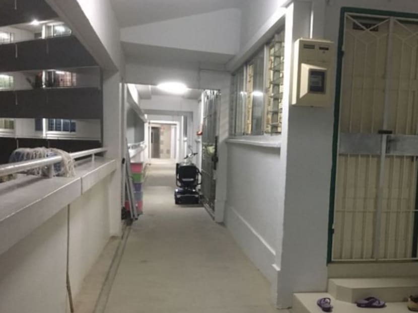 A woman was found dead in her flat unit at Block 276 Tampines Street 22 on Monday (Feb 13). Photo: Channel 8