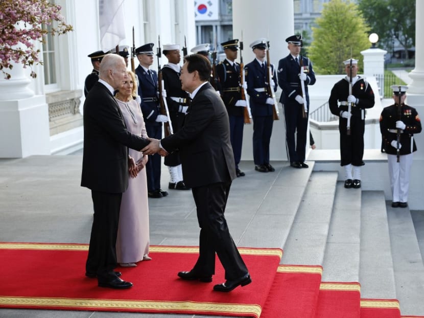 US President Joe Biden (L) and first lady Jill Biden welcome South Korean President Yoon Suk-yeol to the North Portico of the White House, April 26, 2023 in Washington, DC.