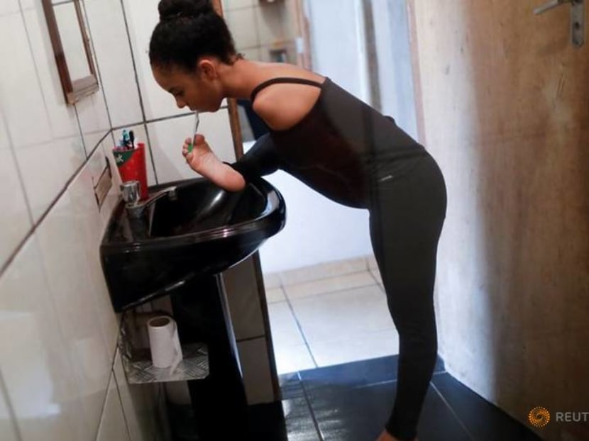 Brazilian ballerina born without arms soars with her attitude Brazilian ballerina born without arms soars with her attitude