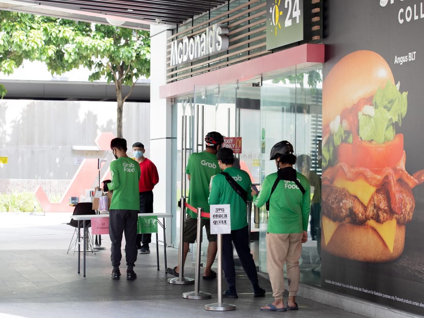 Food delivery riders collecting the McDonald’s BTS Meal at the fast-food outlet in Jem mall on June 21, 2021. Food delivery riders collecting the McDonald’s BTS Meal at the fast-food outlet in Jem mall on June 21, 2021.
