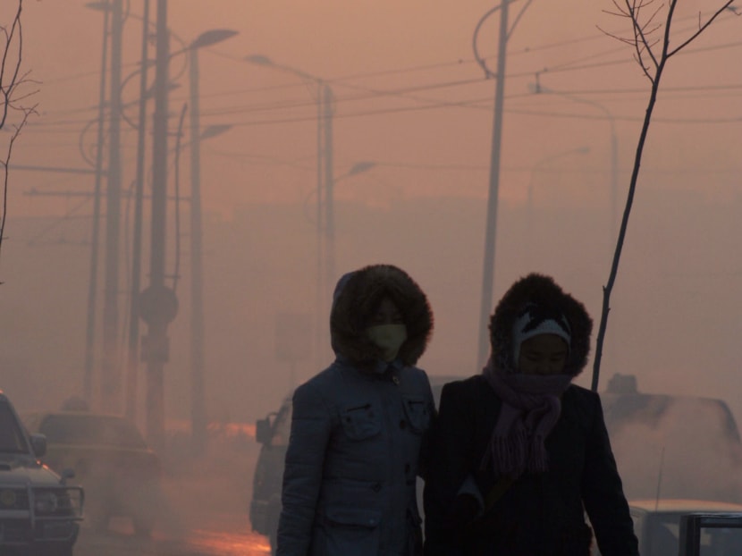 Pedestrians making their way along a street in capital Ulan Bator in this picture taken on Jan 12, 2012. Photo: AFP