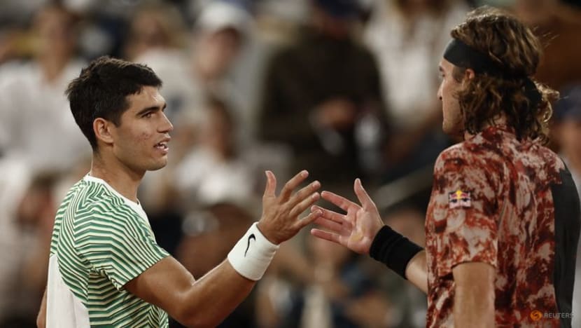 Top seed Alcaraz hunts down Tsitsipas to set up Djokovic showdown