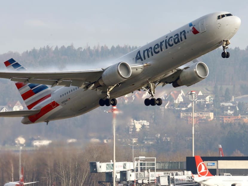 American Airlines Boeing 767-300 aircraft takes off from Zurich Airport. US airlines plan to comply with a Chinese government demand that they revise their website identifications of Taiwan to reflect China’s claim on the island territory.