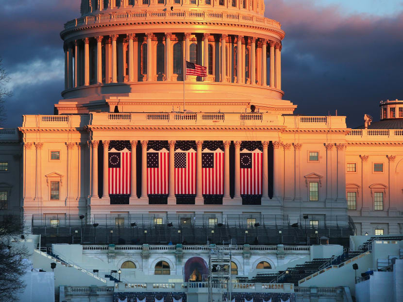 The sun sets on the West Front of the US Capitol building ahead of inauguration ceremonies for President-elect Donald Trump on Jan 18, 2017 in Washington, DC. Photo: AFP