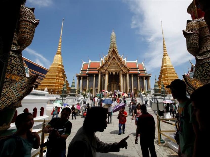 Thailand has one of the lowest unemployment rates in the world. Here, tourists visit the Grand Palace in Bangkok. Photo: REUTERS