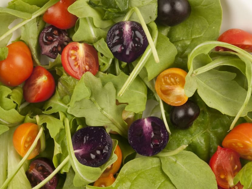 This image provided by The John Innes Centre, UK, shows a salad made with genetically-modified red and purple tomatoes. Photo: AP