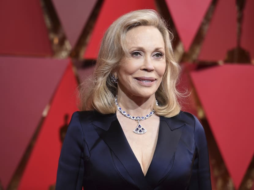 Faye Dunaway, seen here arriving at the Oscars on. Dunaway says she thought co-presenter Warren Beatty was joking when he paused before showing her the envelope with the Oscar’s best picture winner. AP file photo