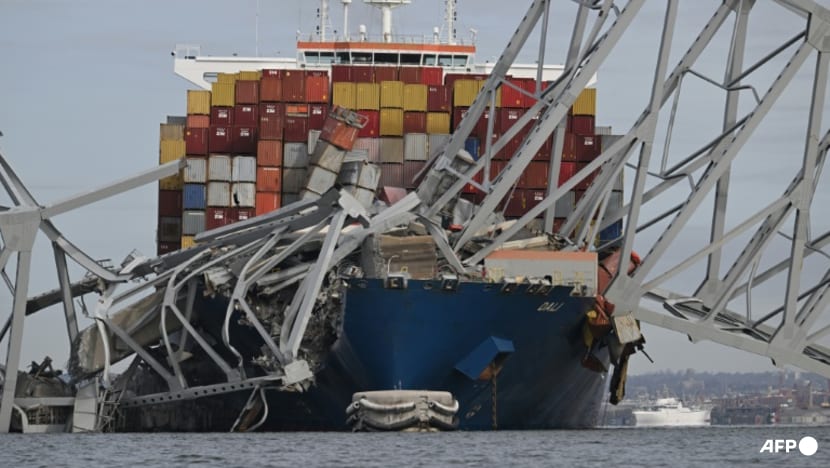 Six presumed dead after crippled Singapore-flagged cargo ship knocks down Baltimore bridge