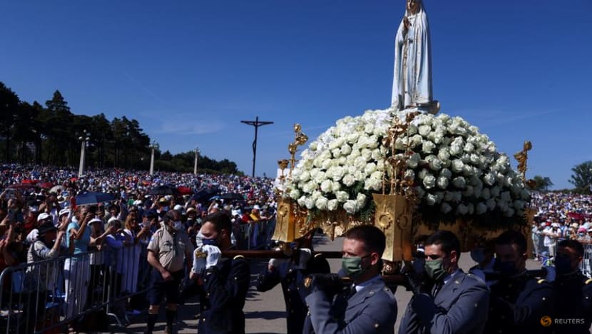 'Not free from COVID-19': Thousands pray at Portuguese shrine despite fears of new wave 'Not free from COVID-19': Thousands pray at Portuguese shrine despite fears of new wave