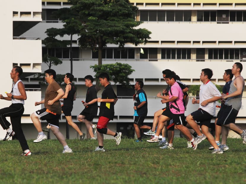 NS men doing exercises during a training session in Maju Camp on July 23, 2014. Photo: Ooi Boon Keong