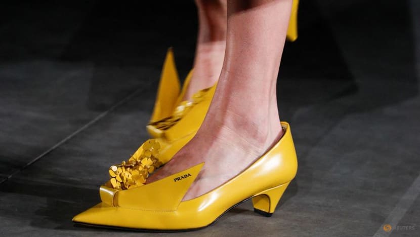 Prada brings blooming flowers to designs at Milan Fashion Week Prada brings blooming flowers to designs at Milan Fashion Week
