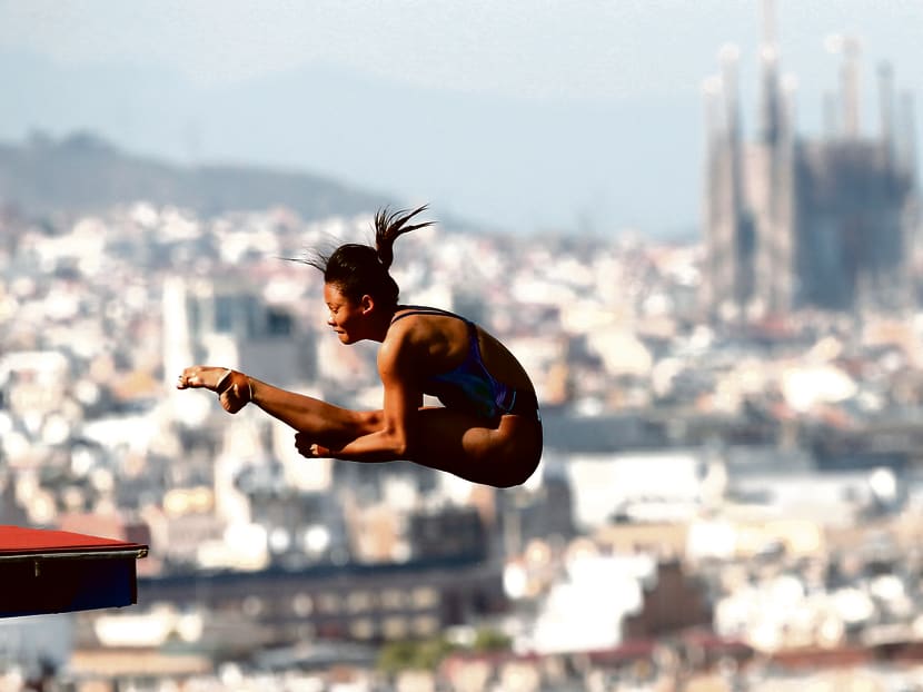 Malaysia's Pandelela Rinong Pamg performs a dive at the women's 10m platform final during the World Swimming Championships at the Montjuic municipal pool in Barcelona on July 25, 2013. Photo: Reuters