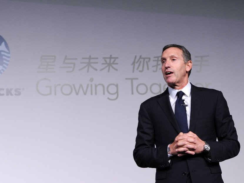 This file photo taken on April 18, 2012 shows Mr Howard Schultz, president and chief executive officer of Starbucks, delivering his speech at the Starbucks Partner Family Forum in Beijing.