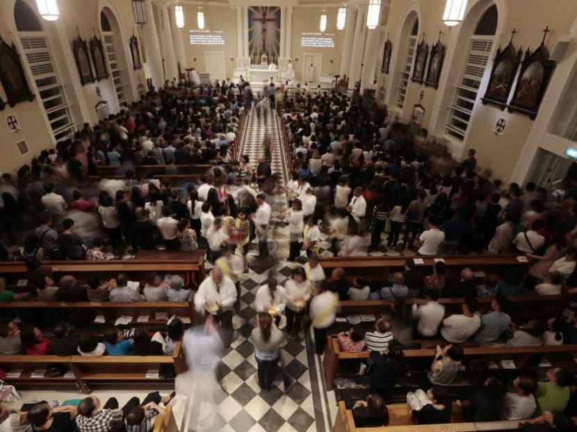 A file photo of Catholic parishioners at a Mass held in the Cathedral of the Good Shepherd near Bras Basah. A file photo of Catholic parishioners at a Mass held in the Cathedral of the Good Shepherd near Bras Basah.