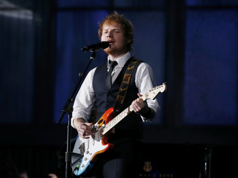 He may have a commanding presence onstage, but at a fan meet in Sydney, Ed Sheeran was so down-to-earth, slipping into the room so quietly you might have missed him. Photo: Reuters