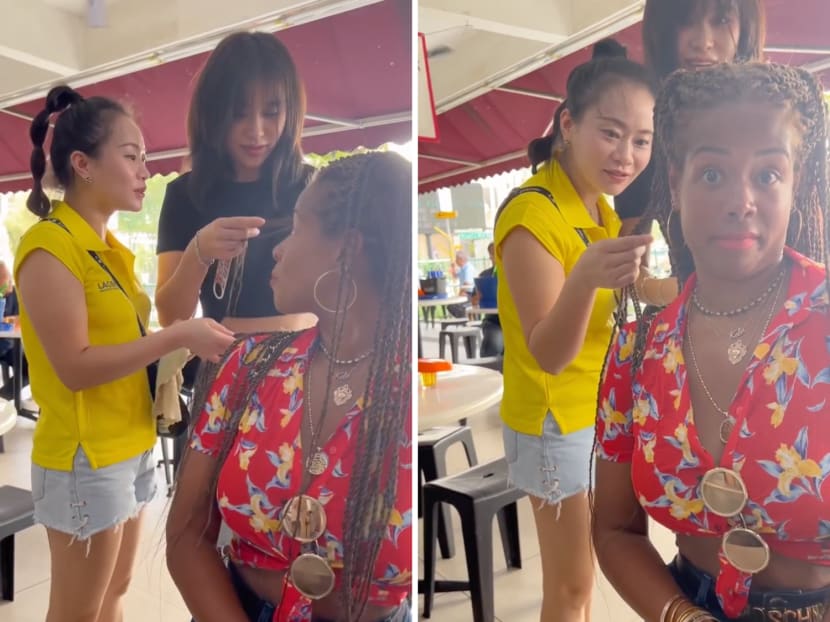 In a video posted by American singer Kelis on Instagram, two Chinese women can be seen touching and playing with her hair at a coffee shop in Chinatown, Singapore. In a video posted by American singer Kelis on Instagram, two Chinese women can be seen touching and playing with her hair at a coffee shop in Chinatown, Singapore.