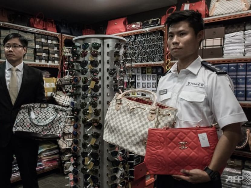 Commentary: Who on earth still buys counterfeit branded goods?