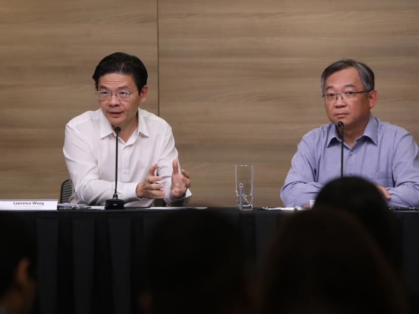 National Development Minister Lawrence Wong (left) and Health Minister Gan Kim Yong (right) at a media briefing on the coronavirus outbreak on Feb 12, 2020.