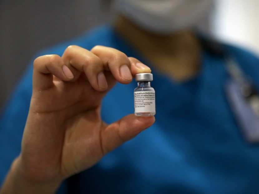 More than 155,000 people have received their first dose of the Pfizer-BioNTech vaccine (pictured) in Singapore.