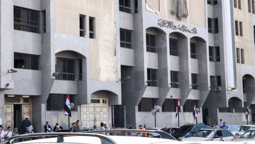 'Don't worry', says jailed Egypt rights researcher as he is driven from court 'Don't worry', says jailed Egypt rights researcher as he is driven from court