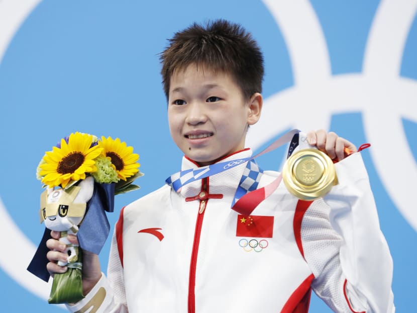 Quan Hongchan of China poses with her gold medal for the women's 10-meter platform diving at the Tokyo Olympics at the Tokyo Aquatics Centre on Aug. 5, 2021.