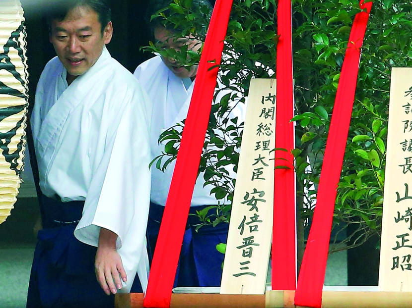 A wooden sign reading 'Prime Minister Shinzo Abe' is seen on a ritual offering from Mr Abe to Yasukuni at the shrine in Tokyo. PHOTO: REUTERS
