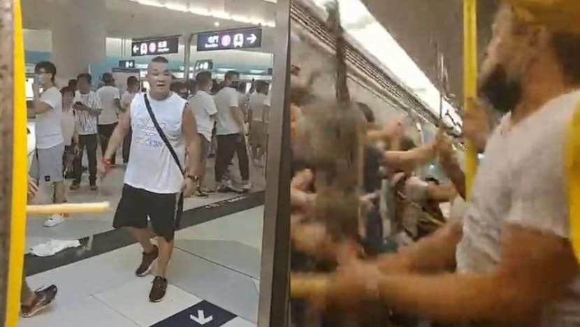 Masked men assault protesters, commuters in Hong Kong MTR station