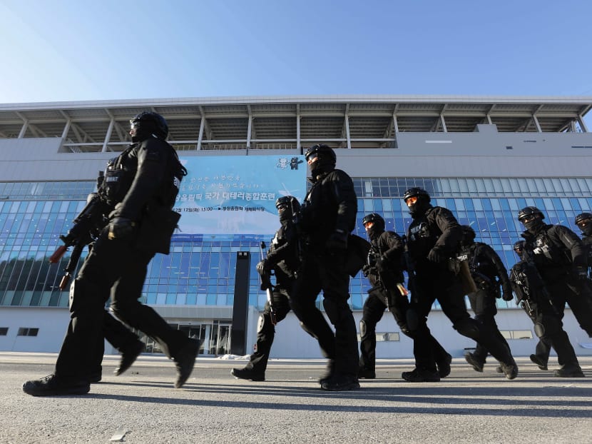 South Korean special police  participate in an anti-terror drill at the Olympic Staduim, venue of the Opening and Closing ceremony on Tues (Dec 12) in Pyeongchang-gun, South Korea. Seoul is concerned of provocation by Pyongyang during the games. Photo: Getty