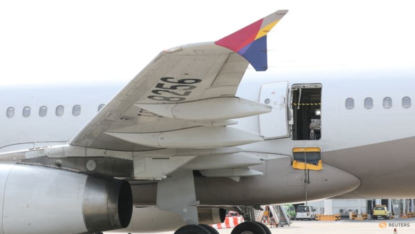 Man who opened Asiana plane door says he felt 'suffocated' and 'wanted out quickly'