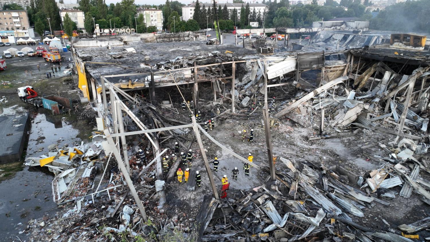 <p>Rescuers work at a site of a shopping mall hit by a Russian missile strike, as Russia's attack on Ukraine continues, in&nbsp;Kremenchuk, in Poltava region, Ukraine, in this handout picture released on June 28, 2022.&nbsp;</p>
