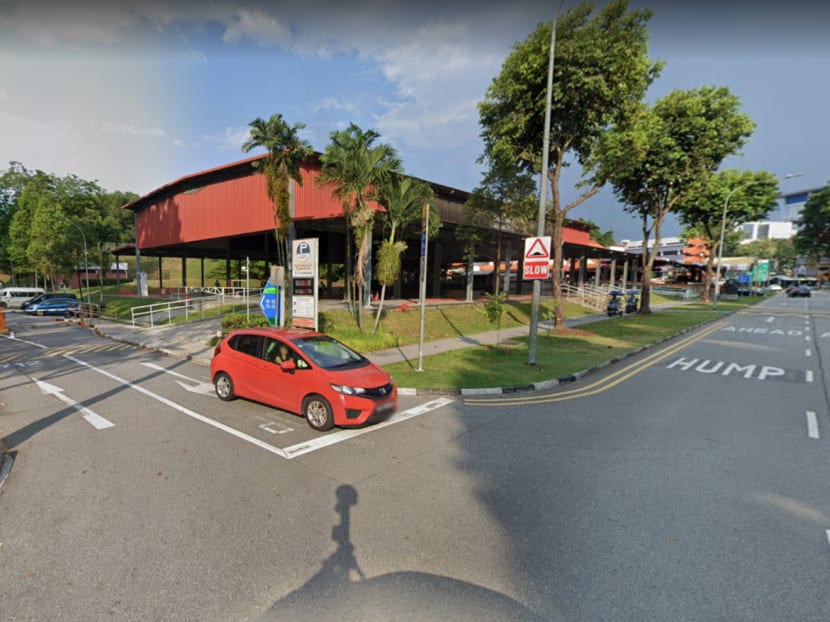<p>The non-signalised T-junction leading to the entrance and exit of the open-air car park of Block 165 Yishun Ring Road, where an accident claimed the life of motorcyclist Leong Chee Kiong.</p>
