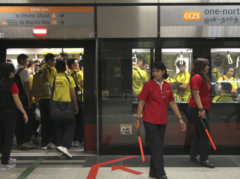 Students from Anglo-Chinese School taking a chartered MRT train at One North station to catch the Schools National C Division rugby championship final between Anglo-Chinese School (Independent) and St Andrew's Secondary (SAS) at the Sports Hub. Photo: Don Wong