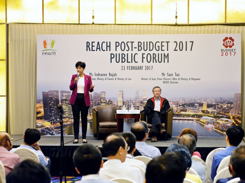 Senior Minister of State Indranee Rajah and Minister of State Sam Tan at the forum yesterday. Ms Indranee said that measures such as the U-Save (Utilities-Save) rebates would lessen the cost burden on households following the hike in water prices, which was announced in the Budget on Monday. Photo: Robin Choo