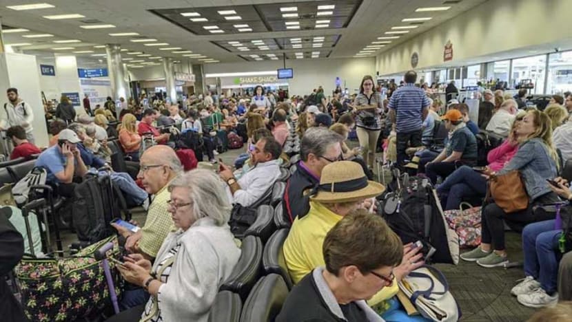 Chaos at US airports as COVID-19 medical screenings jam up returning Americans Chaos at US airports as COVID-19 medical screenings jam up returning Americans