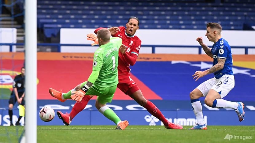 Football: Van Dijk injury causes concern for frustrated Liverpool Football: Van Dijk injury causes concern for frustrated Liverpool