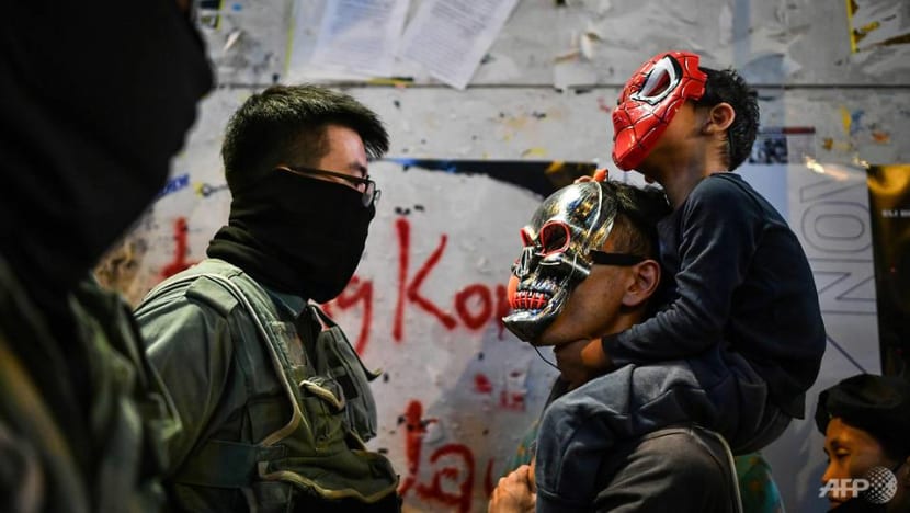 Tear gas as Hong Kong protesters don Halloween masks Tear gas as Hong Kong protesters don Halloween masks