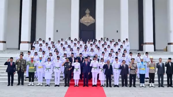 Indonesia allows female flag-raising troop members to don hijab at Independence Day ceremony, overturning earlier ban 