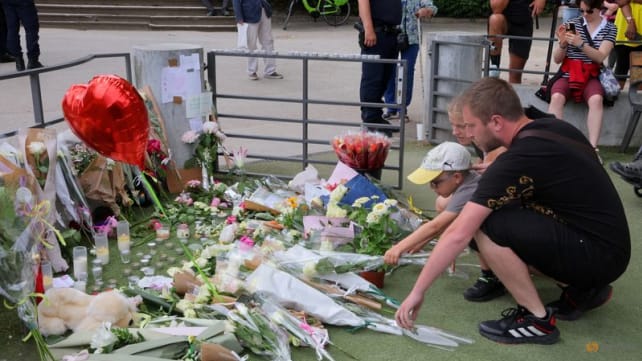 Toddlers stable after Annecy attack, France lauds 'backpack hero'