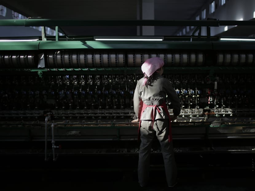 Gallery: Silk, steam and slogans: Inside a North Korean factory