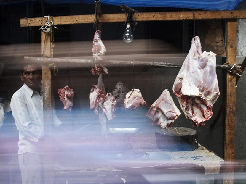 A vendor sells beef at a roadside stall in Mumbai, in 2012. The government of the state of Maharashtra this week banned eating and slaughtering cows, steer and their byproducts. Photo: Bloomberg