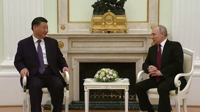 习近平抵达俄罗斯莫斯科同普京举行峰会