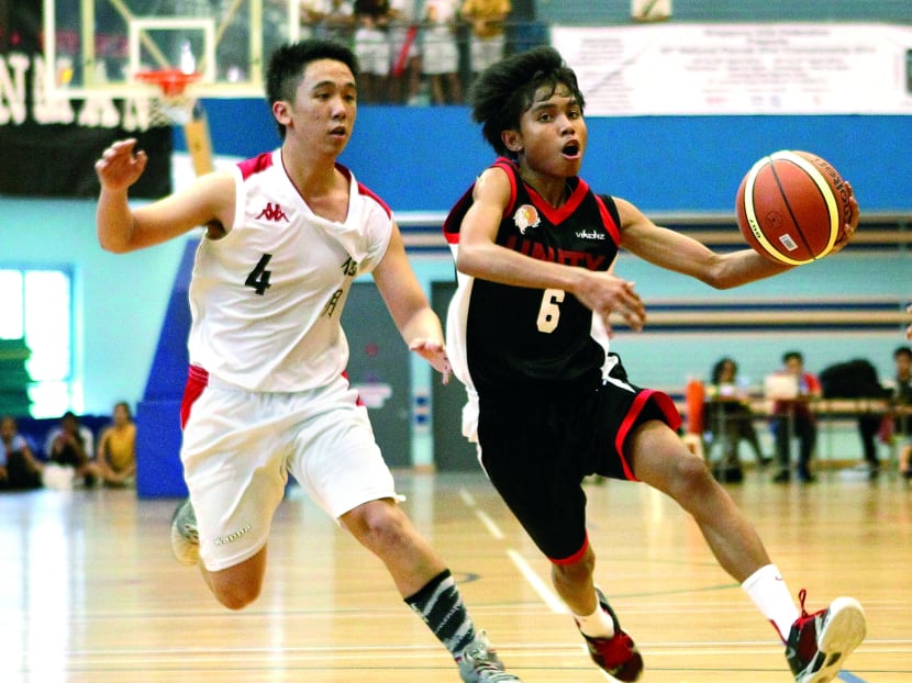 John Christopher (right) earned the  MVP accolade for his performance in the ‘B’ Div final. Photo: Wee Teck Hian